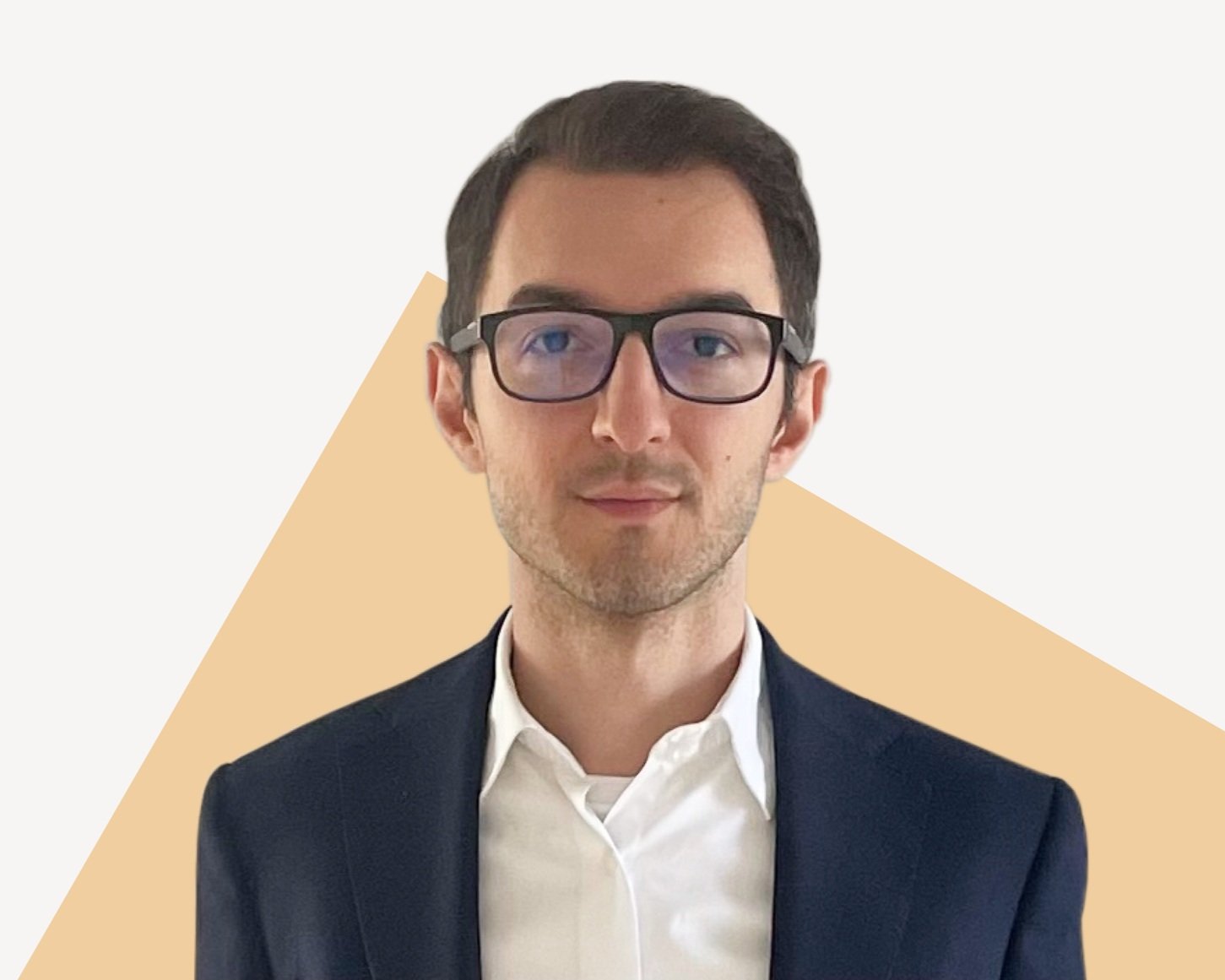 Adrian Constantin, Founder/CEO at Contuvo, wearing glasses and professional attire.
